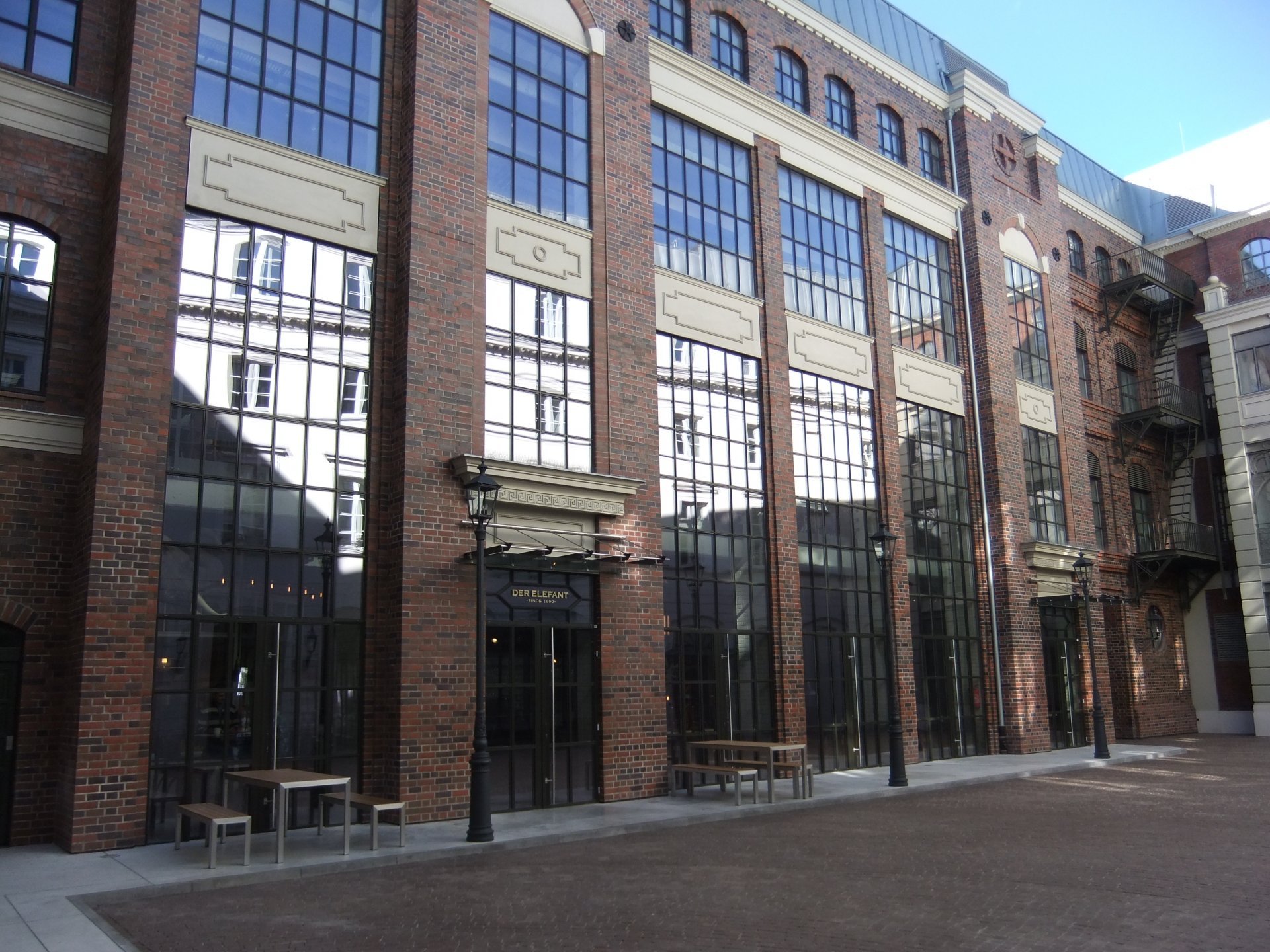 Industrial-style Hansen aluminium windows installed in a heritage brick façade